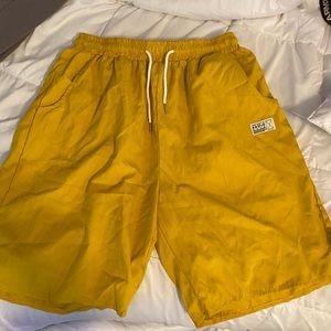 Yellow Board Shorts.